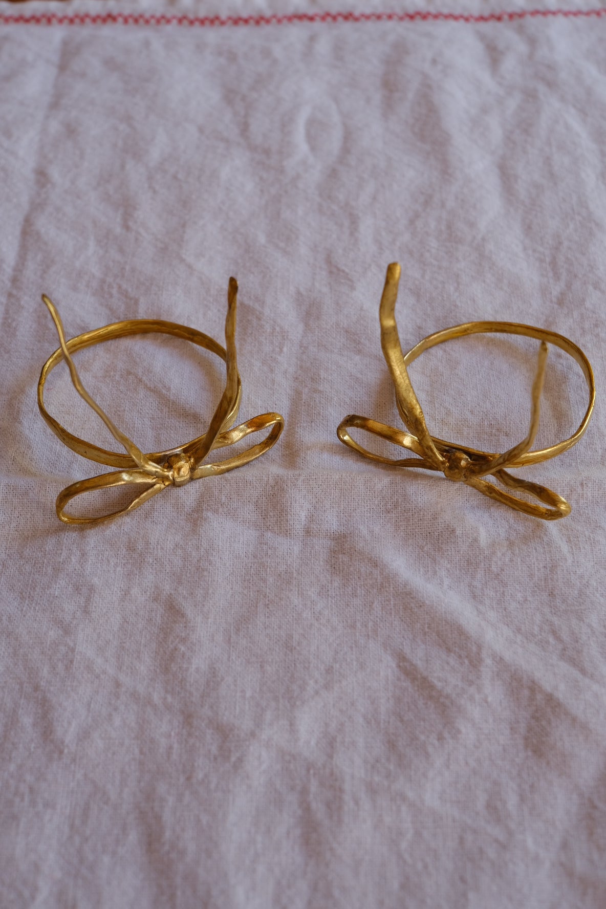 Wrought Brass Bow Napkin Rings