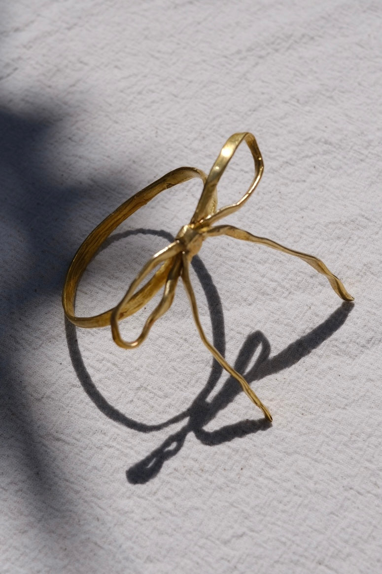 Wrought Brass Bow Napkin Rings
